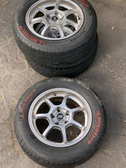 Two tires with rims