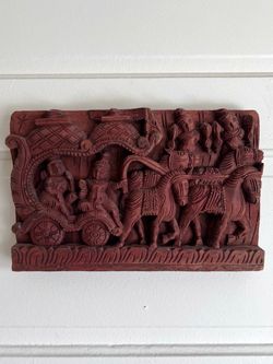 Wood carved panel of Hindu Gods caravan