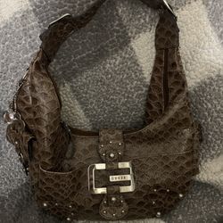 Guess beige textured hobo bag with a buckle detail and side pockets