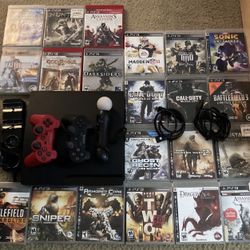 PS3 bundle with games, cables, and 2 controllers