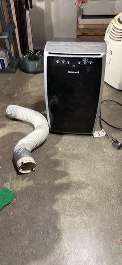Honeywell 12,000 BTU Portable AC.  Host Included - See Photos
