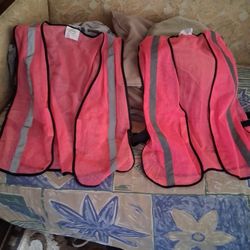2 pink safety vests. Light weight.10 For both.