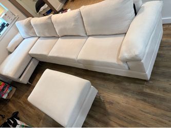 Cream sectional for sale.