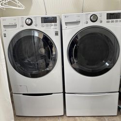 LG front load washer & dryer w/pedestals