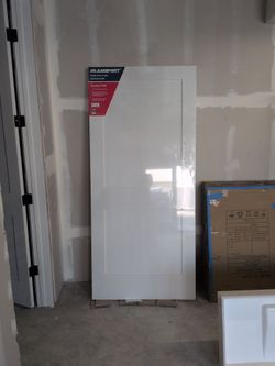 NEW Scrinkarapped Solid Pine 3'0" door.