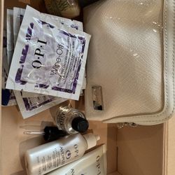 OPI my travel companion set- includes OPI bag,lotion, cuticle treatment, nail strengthener, drying drops and lacquer remover wipes