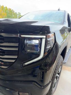 OEM left side GMC 1500 AT4 headlight