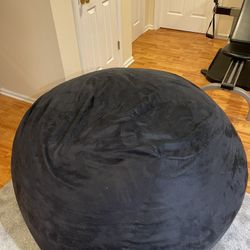 large black bean bag chair