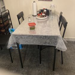 Table And Four Chairs 