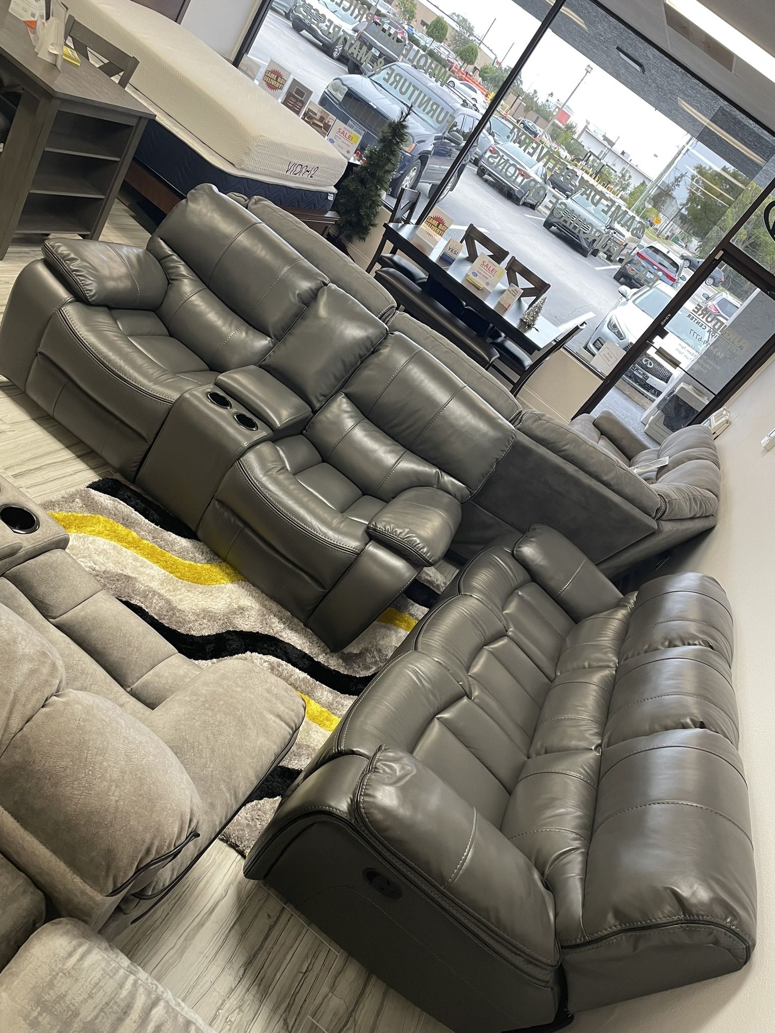 Fourth of July sale. Madrid, gray leather reclining sofa and loveseat set now $1199. Easy finance option. Same-day delivery.