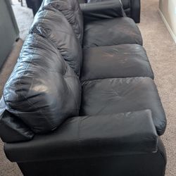 2-Piece Black Faux Leather Couch Set - Used But Comfy