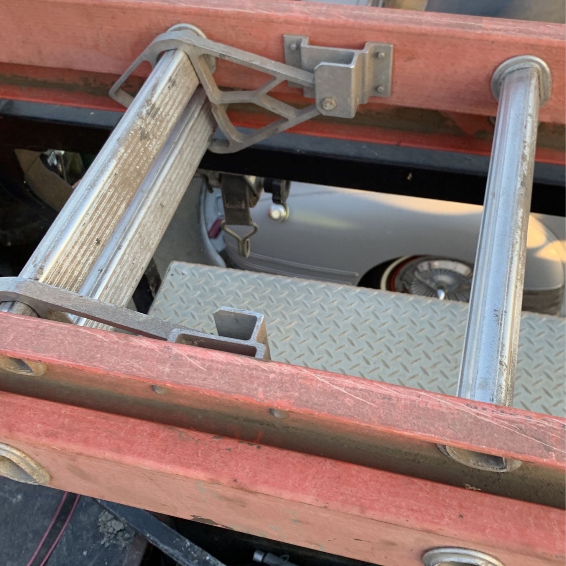 A good 50 foot ladder stand a bowl stretches up