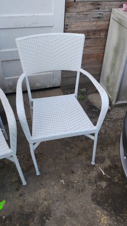 Two White Wicker Chairs