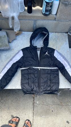 youth Nike Jordan Jumpman Puffer Jacket.Based on the visible collar label,