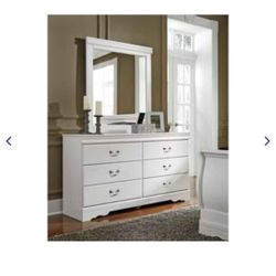 Anarasia White Twin Sleigh Bed and matching dresser