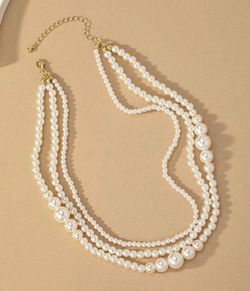 Pearl necklace $23’ $20