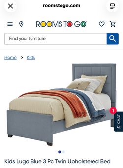 Boys blue twin bed with mattress