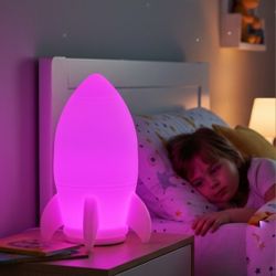 LED Mood/Night Light Color Changing Lunar Rocket Merkury Innovations New In Box. The item is a Mini Rocket Color Changing LED Mood Light by Merkury In