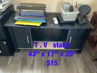 T . V   stand  (43" x 17" x 20")  -  $15