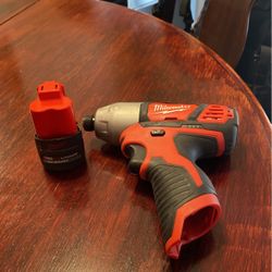 Milwaukee m12 impact  with   one 2.5 battery in great Condition used  very Little lm  asking $70 Dollars Or Best offer.