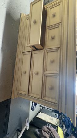 Cream Wood Dresser with Multiple Drawers