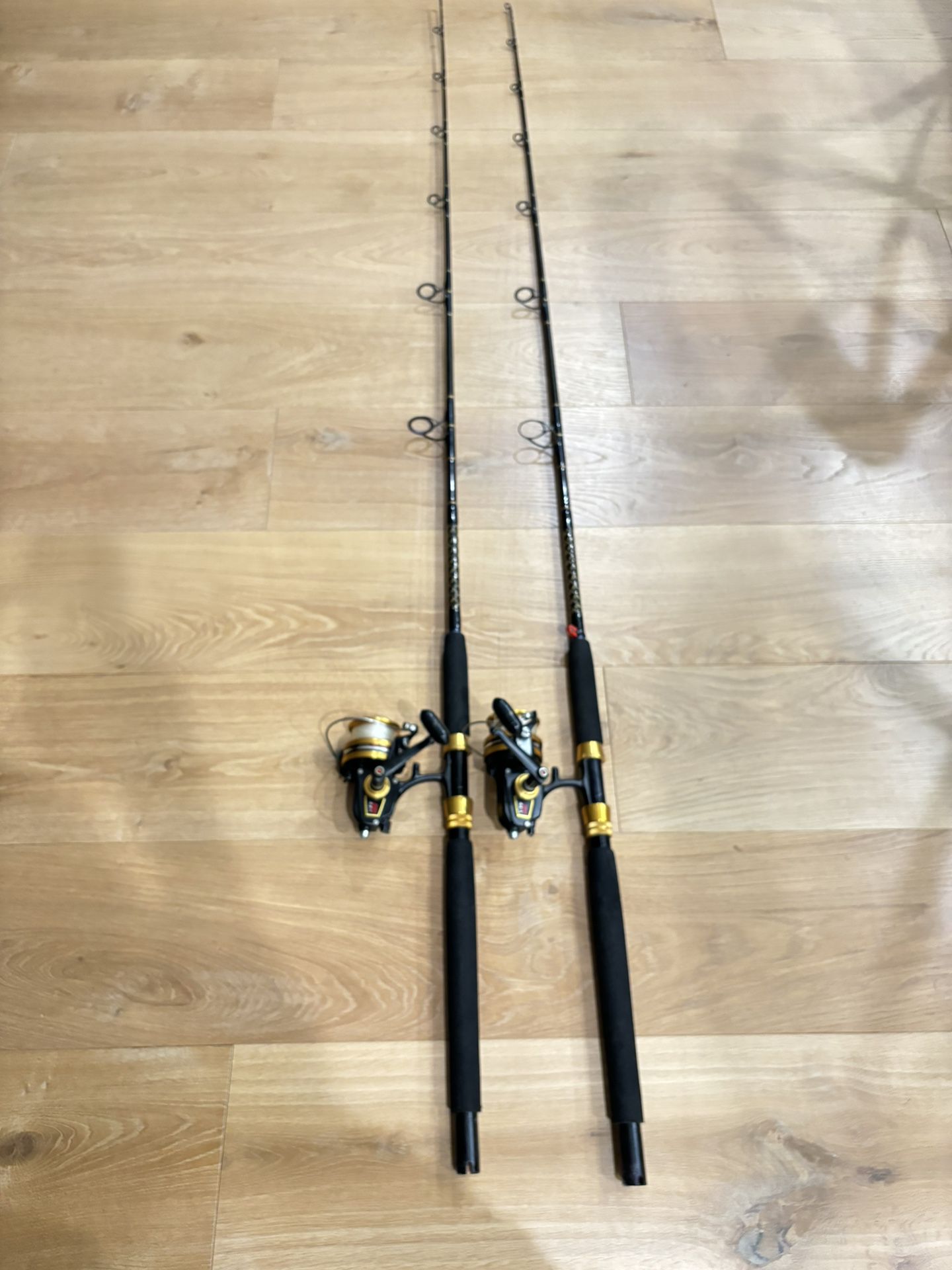 Pair Of Penn 750 SS Fishing Rods And Spinning Reels