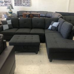New Dark Grey Sectional And Ottoman 