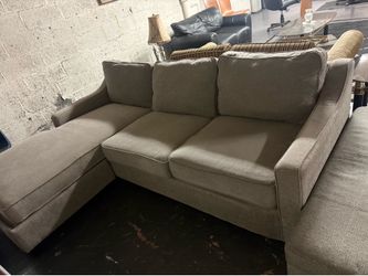 Sofa in good condition and ottoman twin bed