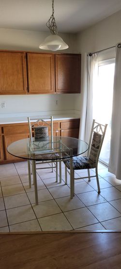 Dinning table  ( or glass table)  and ONLY 2 chairs