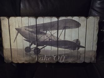 Wall art titled "fly away" and "take off"