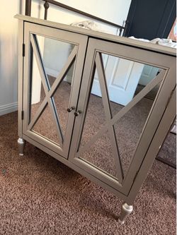 Mirrored door cabinet