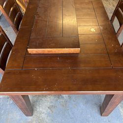 Solid wood table and 4 Chairs - NEEDS REFINISHING