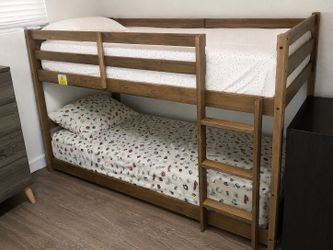 Brown low twin bunk beds
