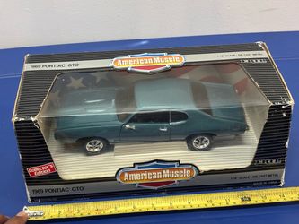 ERTL American Muscle 1:18 Scale Crystal Turquoise 1969 Pontiac GTO Diecast Car