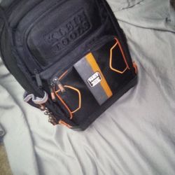 


+2
The item is a Klein Tools backpack, likely the 62201MB MODbox Electrician's Backpack or the 55421BP-14 Tradesman Pro Backpack