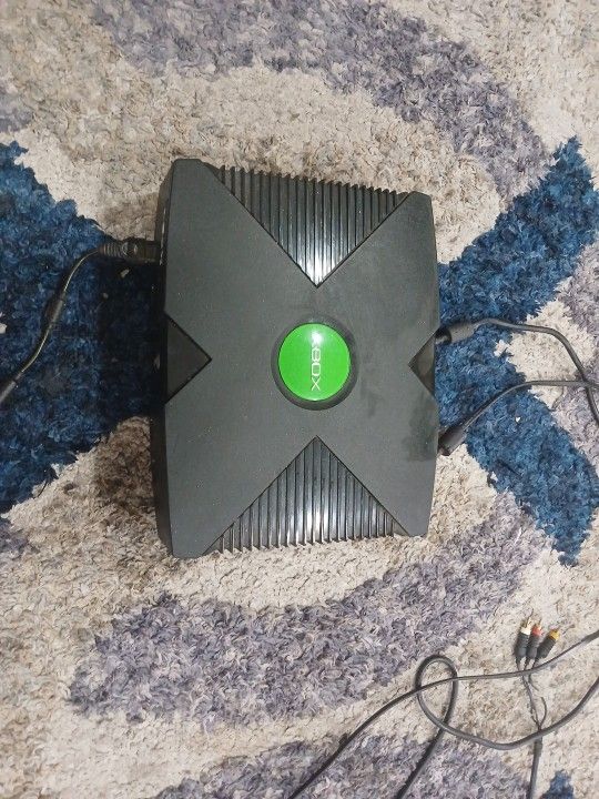 Xbox One With Controller And A TV That Connects To It