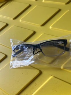 A pair of reading glasses (readers).