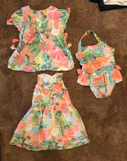 Toddler bathing suit and cover up. Matching dress.