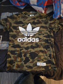 This is not a regular Adidas shirt its ape to read description