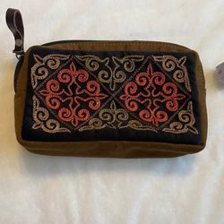 Suide pouch with trad embroidery