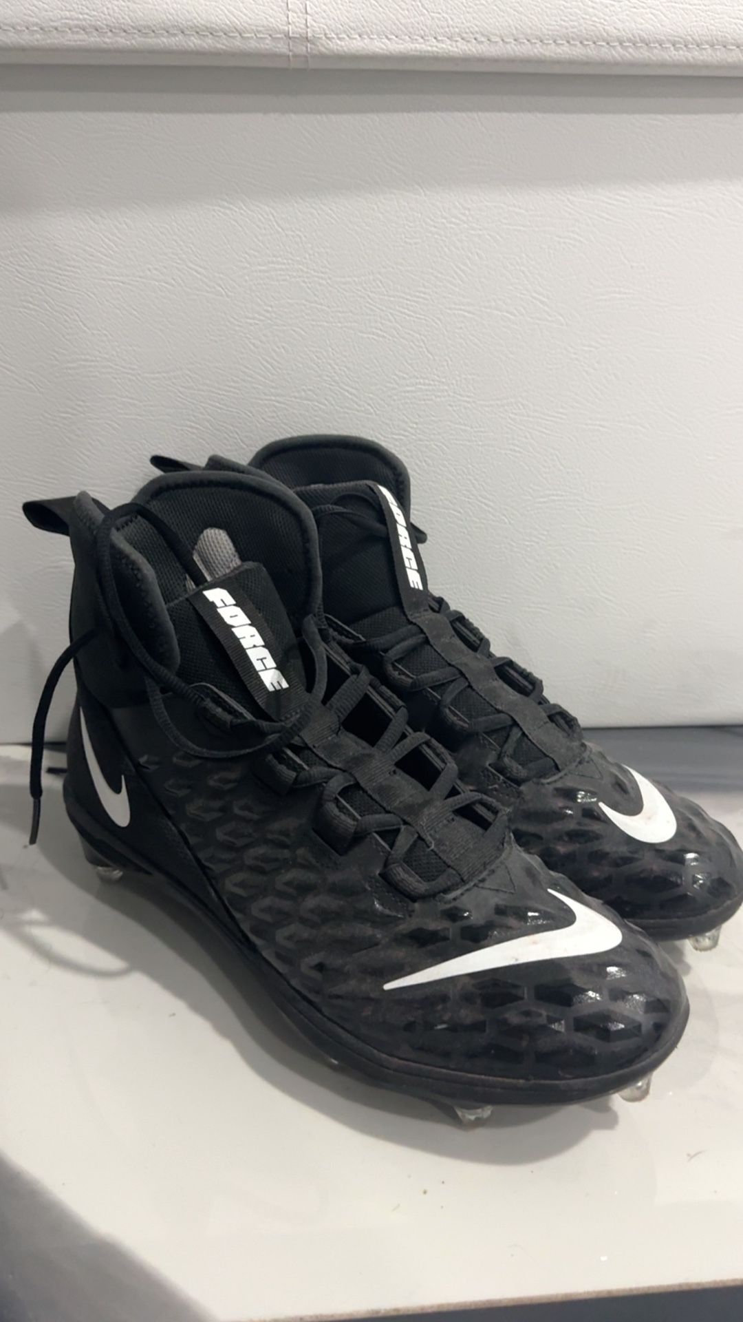 Football cleats (size 10)