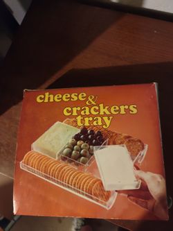 Older Cheese and crackers tray with containers