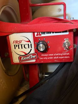 First Pitch BaseLine Pitching Machine  & Batting Cage