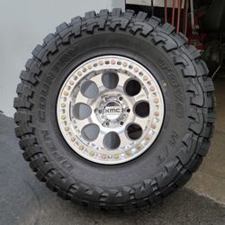 17" KMC beadlocks w/ 35x12.50R17 Toyo MT Open Country