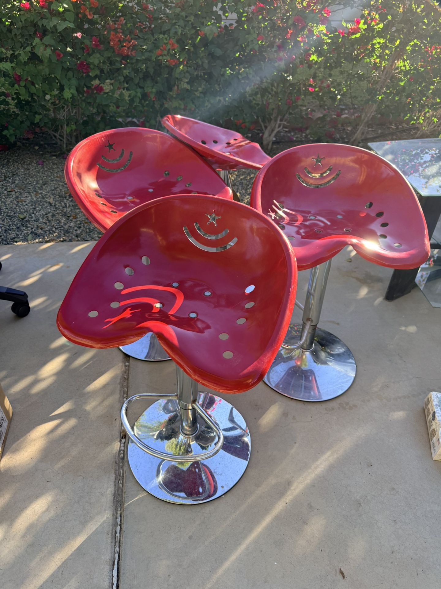 4 Red Metal Tractor Seat Barstools