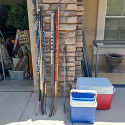 Used Hockey Sticks $5-$10 Each And Blue Igloo Ice Chest Cooler $10