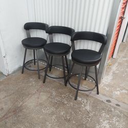 3 METAL SWIVEL STOOLS