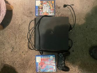 PS4 with controller and two games