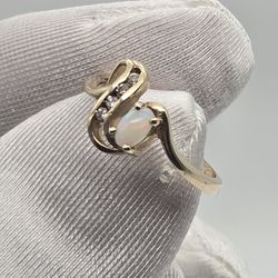 10 K Oval Opal Stone W/Diamonds