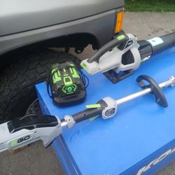 Ego weed eater And blower combo with battery in charger.